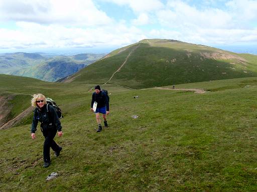 12_03-2.jpg - Chrissy and Tony climbing to Crag Hill with Grasmoor behind