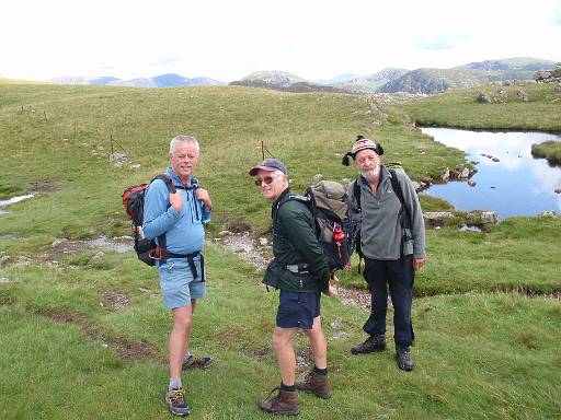 09_28-1.jpg - Phil, Paul and Brian at the top of Black Sail Pass. All look ready to continue the climb to Looking Stead.