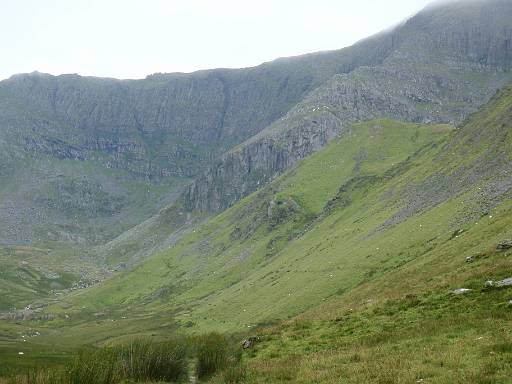 08_32-1.jpg - Closer shot of the cliff. My route climbs the spine above it.