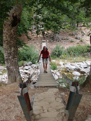 08_22-1.jpg - Phil crossing the wobbly footbridge