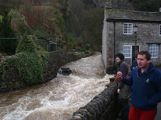 10_58-1.jpg - Water rushing out of Peak Cavern