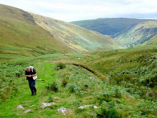 11_12-1.jpg - Clive climbing towards the Berwyns with views down Nant y Lynn