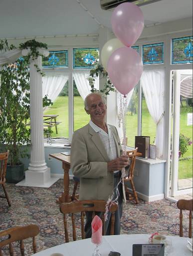 img_0160.jpg - Is he pinching those balloons?